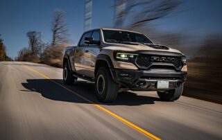 ram 1500 driving on road